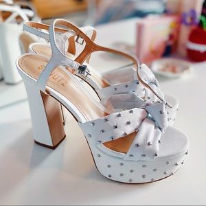 Schutz White platform heels, new never worn.
